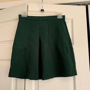 Green girly mini skirt